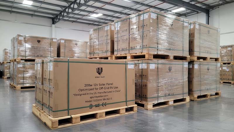 Spunky Solar warehouse — pallets of 200W panels ready for fast dealer shipping